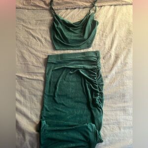 brand new. emerald green glitter 2 piece crop top and skirt.